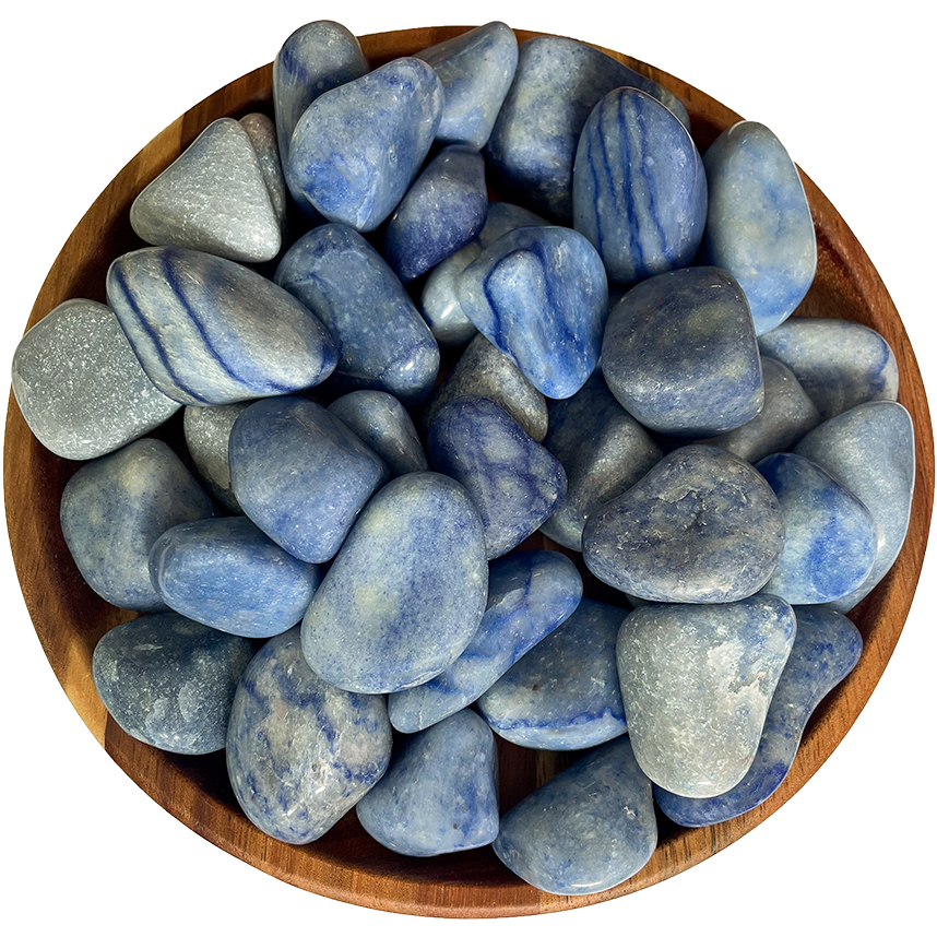 A collection of blue aventurine on a wooden plate.